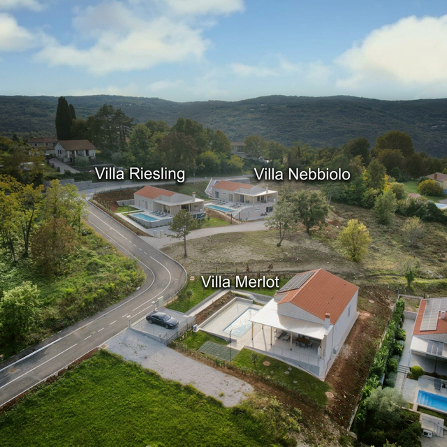 Western Part — drone aerial view with villa labels